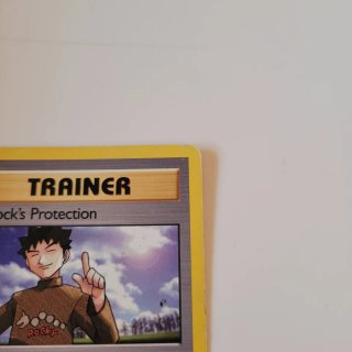 Carta Pokémon Trainer Brock's Protection 101/132