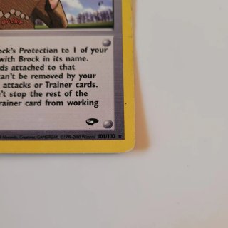 Carta Pokémon Trainer Brock's Protection 101/132