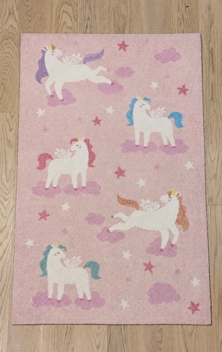 Alfombra infantil unicornios rosa.