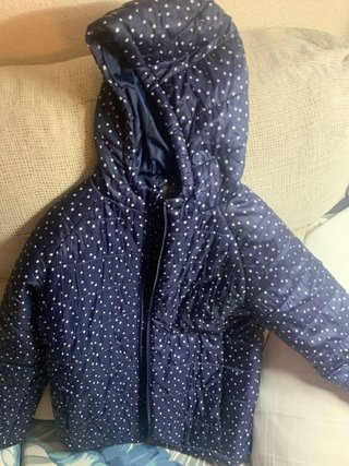 Chaqueta infantil azul con lunares blancos