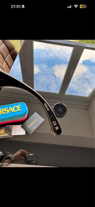 Gafas de sol Versace negras y doradas