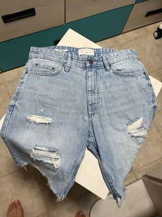 Pantalones vaqueros desgastados