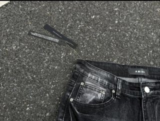 Pantalones Amiri negros/grises con etiquetas