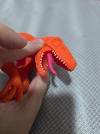 Marioneta Dinosaurio Naranja de Goma
