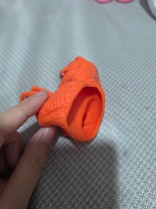 Marioneta Dinosaurio Naranja de Goma