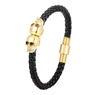 Pulsera Cuero Trenzado con Calaveras Doradas
