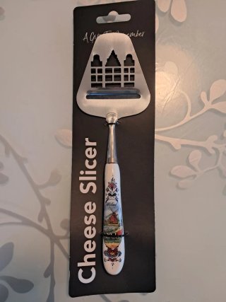 Affetta formaggio decorato