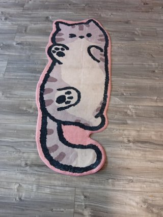 Alfombra con forma de gatito. 1'35mX0'50m