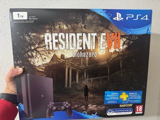 Playstation 4 de 1TB + 2 mandos + 5 juegos