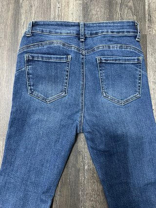 Pantalones vaqueros campana con flecos