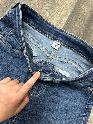 Pantalones vaqueros campana con flecos