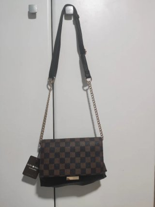 Bolso de mano cuadros marrón y negro