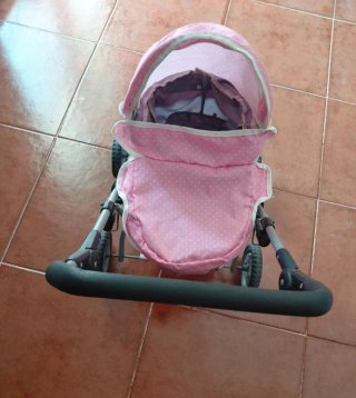 Carrito de juguete rosa lunares