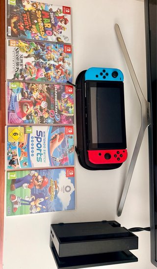 Nintendo Switch + 5 Juegos