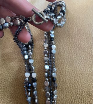 Collana con perline cristalli e ciondolo circolare