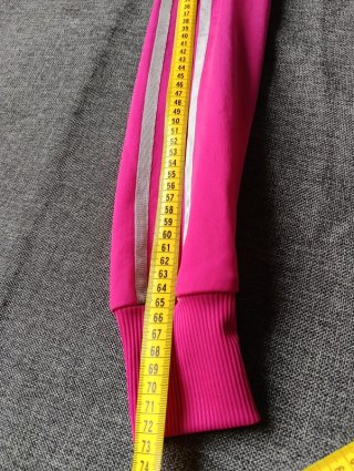 Chaqueta de chándal rosa fucsia de Adidas