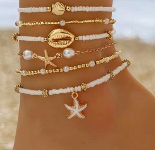 Pulsera tobillera conchas y estrellas doradas