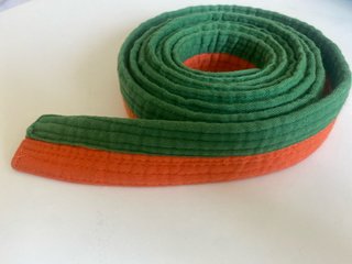 Cinturón artes marciales verde-naranja