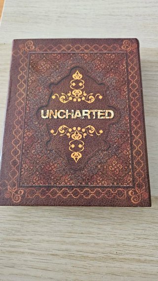 Uncharted Nathan Drake PS4 + Caja Reserva