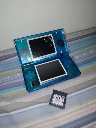 Nintendo DS Lite Blu Trasparente con 1340 giochi