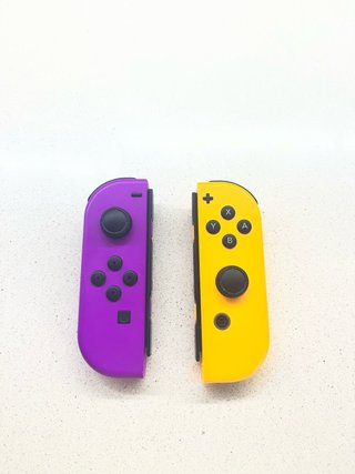 Joycons Nintendo Switch Morado y Amarillo
