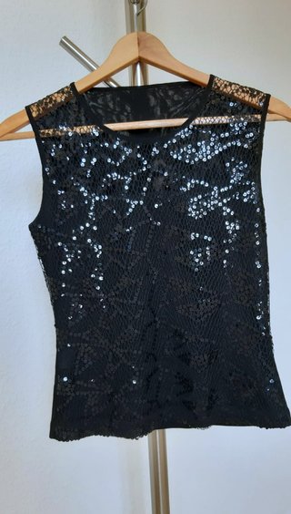 Top sin mangas. De lentejuelas. Nuevo. Color negro