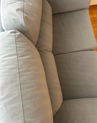 Sofá gris de tela