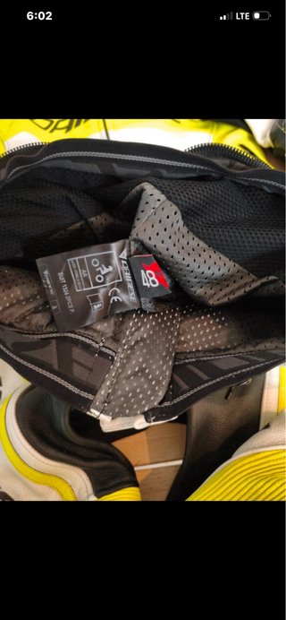 Mono Dainese Blanco y Amarillo talla 48/S
