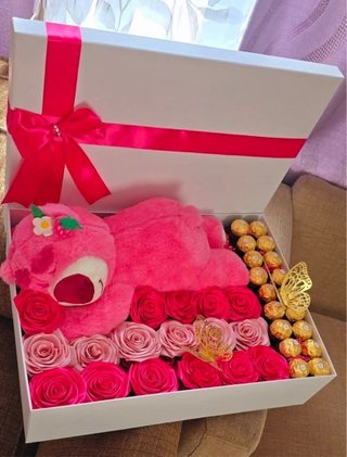 Caja con peluche dormilon