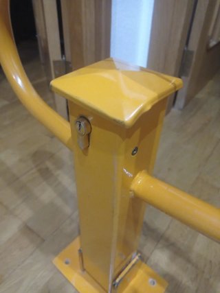 Barrera/cepo garaje naranja plegable