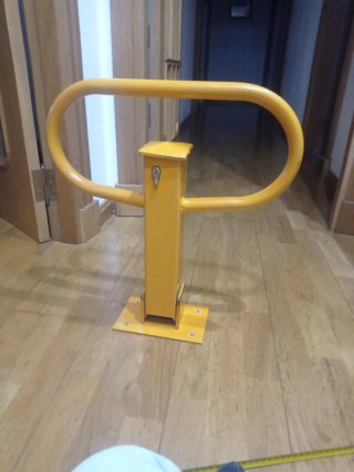Barrera/cepo garaje naranja plegable