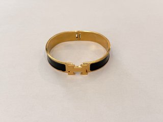 Brazalete Hermès Dorado y Negro