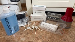 Roborock S7 y base de autovaciado con accesorios o