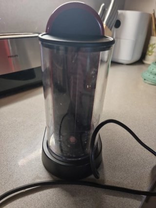 Macchina da caffè Nespresso rossa