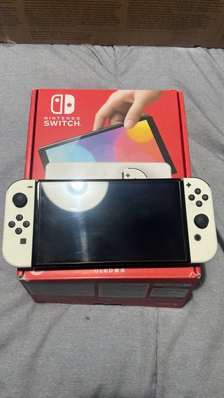 Nintendo Switch OLED Blanca y Negra + Mario Tennis