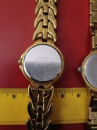 Pareja de relojes dorados antiguos