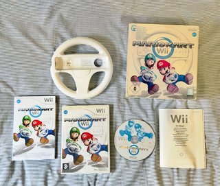 Mario Kart Wii + Volante Wii + Caja instrucciones