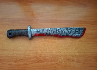 Cuchillo plástico Halloween sangriento