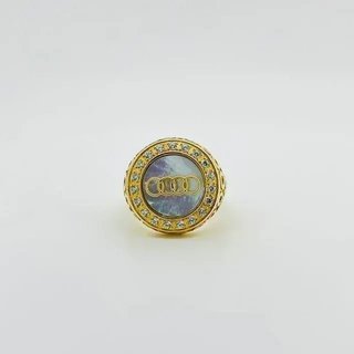 SELLO REDONDO AUDI CON NACAR Y CIRCONITA 18K