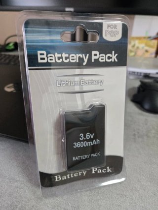CARICATORE + BATTERIA PSP-1000