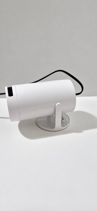 Mini proyector AMX100 con mando