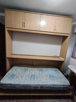 Cama abatible con armarios