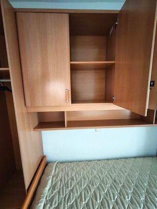 Cama individual con armario y colchón