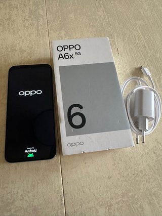 Oppo A6x 5G con cargador y cable
