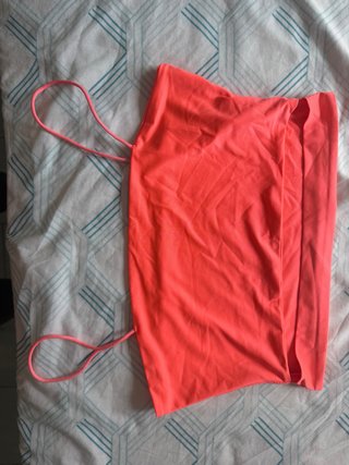 Top rosa fucsia con abertura