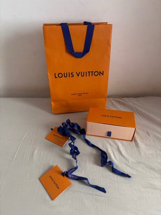 Caja y bolso Louis Vuitton naranja
