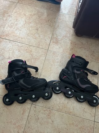 Patinetes Oxelo negros con detalles rosas