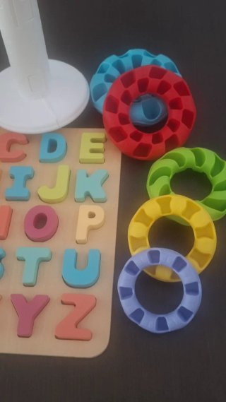 Juguete Educativo: Tabla de Letras y Anillas