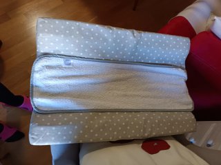 Cambiador con funda impermeable