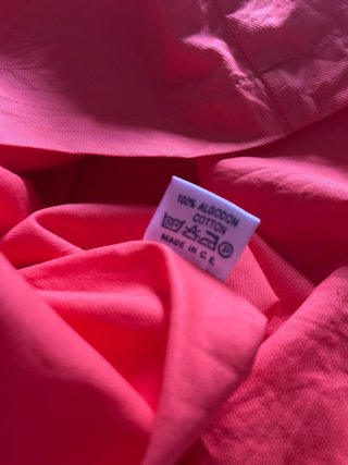 Vestido naranja y rosa con volantes
